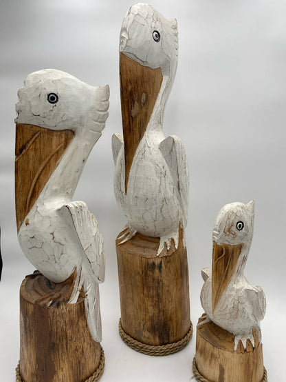 SET OF 3 CARVED WOOD PELICANS